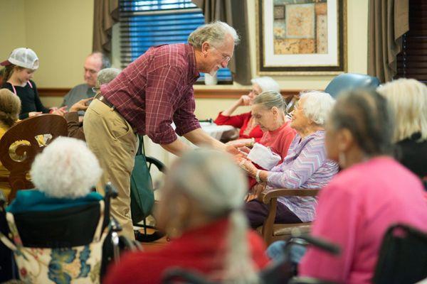 Dr. Ammons sponsors and personally hands out a Christmas stocking to Lee County Alzheimer's Patients in assisted living facilities.