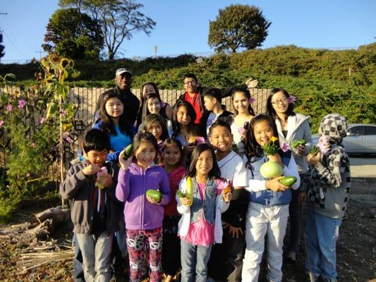 Kids enjoying a day out in the Yesler garden during our Summer Youth Program