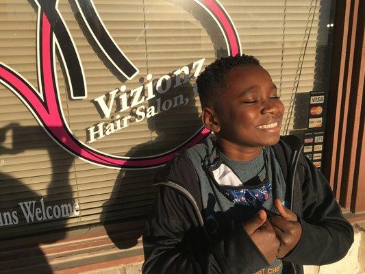 My son is OVER THE MOON happy with his fresh haircut.  A nice compromise btwn the simple upkeep of a BALD fade I prefer and a warm head.