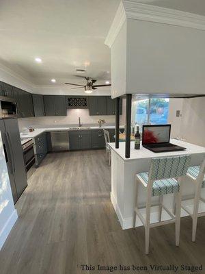 Brand new kitchen cabinets that were created by Yanyan at Rainbow Stone in Chula Vista.