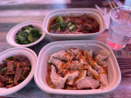 Pork dumplings, Noodles with intestines (spicy), Spicy beef, Steamed vegetables