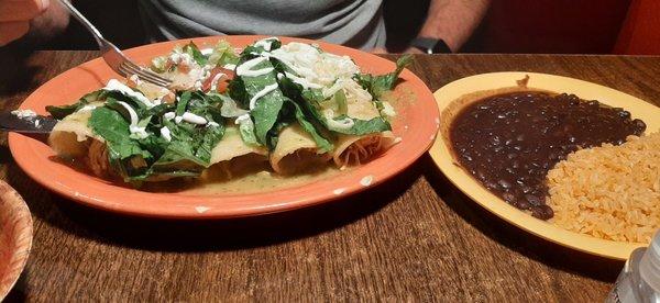 Chicken enchiladas with green sauce, black beans & rice