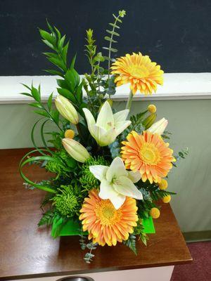 High style arrangement of white lilies, two tone gerberas and billy balls