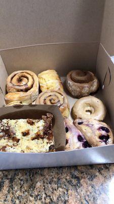 Cinnamon rolls, lemon poppy seed bread, blueberry scone, donut & peach cobbler.  Yum!