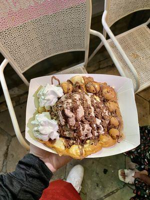 Bubble waffle, chocolate ice cream + cookie butter ice cream, coco pebbles and Nutella drizzle