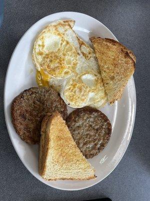 Eggs, sausage patties and hashbrowns