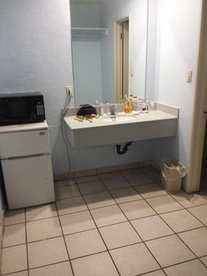 Bathroom, mini fridge and microwave