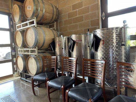 They cut holes in the sides of these oak barrels and bladder the wine, putting the oak chips in it to age making them efficiently reusable.