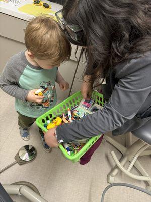 Picking out a prize after his visit