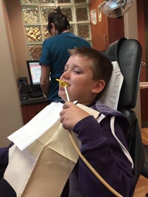 My oldest son getting a fluoride treatment!