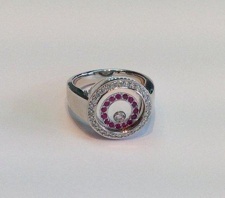 18k white gold diamond and ruby floating ring