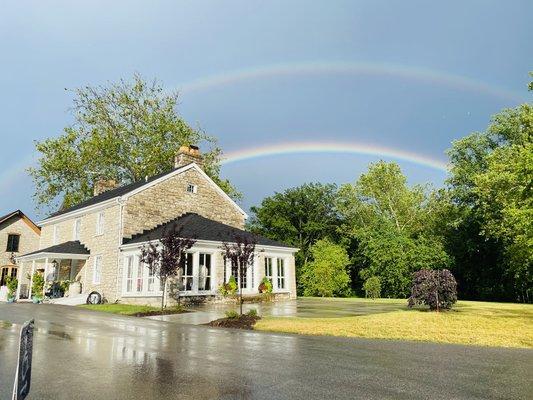 Stone house of St. Charles after a rain.