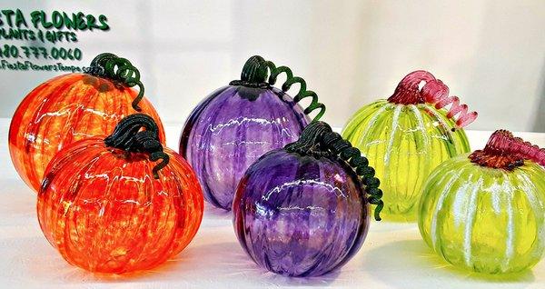 Hand blown glass pumpkins. Find at: https://fiestaflowersaz.com/product/hand-blown-glass-pumpkins/