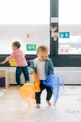 toddler at play in our bright classroom