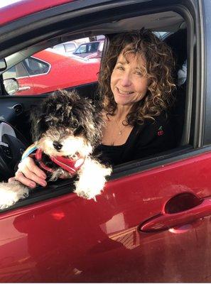 Happy dog mom with her repaired tire from Les Schwab Eugene