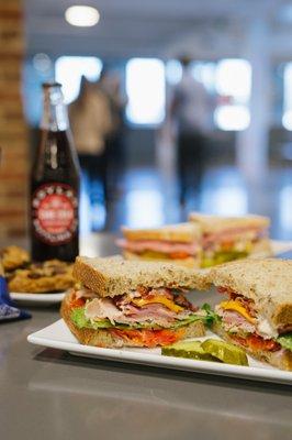 Take it Away: Tasty Sandwiches with all-natural meats and cheeses, freshly baked loaves of bread, and specialty House Dressing.