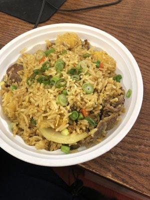 Pineapple fried rice with beef.