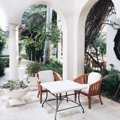 Cozy and lush seating for meals at The Palms Resort, Turks & Caicos