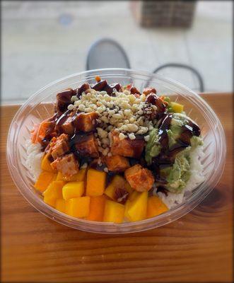 Chicken Build Your Own Poke Bowl- white rice, spicy chicken, edamame, mango, avocado, carrots, sweet soy, & tempura flakes