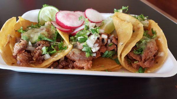 Carnitas and tripa tacos