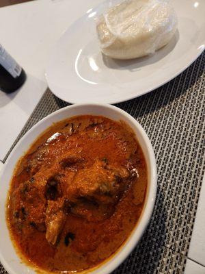 Peanut soup and fufu. Takes a while but worth the wait.