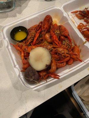 Crawfish, butter, and potatoes