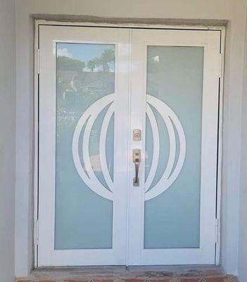 Impact Front door. White frame/ frosted glass and then with some design