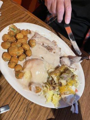 Chicken fried steak, with a side of burrito