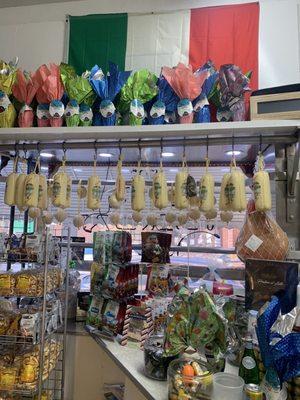 Cheeses hanging inside