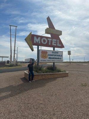 Such a cool vintage Route 66 sign.  The neon at night is awesome as well.