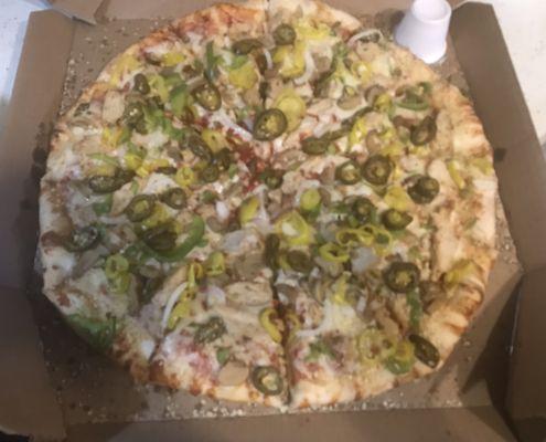 Build Your Own XL - grilled chicken, mushrooms, onions, green pepper, banana pepper, jalapeños and romesan crust