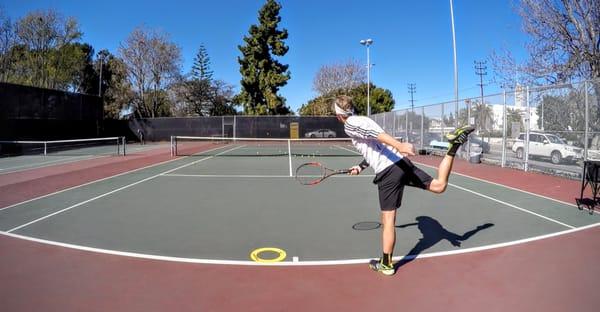 Sam working on his serve!