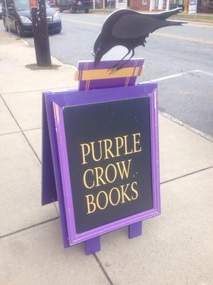 Look for the purple sign, black crow.