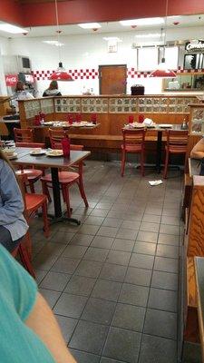 All those tables (every table in the restaurant) were empty of people, but setting with tons of food getting crusty and gross.