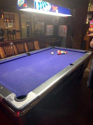 Back of the bar, pool table area.