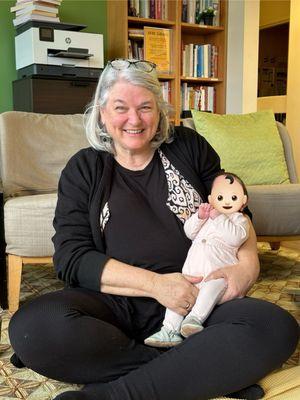 Nancy Myrick, the director of SFBC with my baby a few weeks after she was born at a New Parents Support Group session.