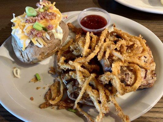 Double pork chops with loaded baked potato