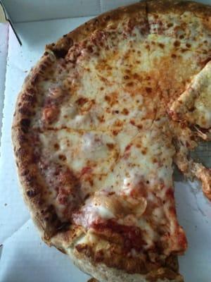 Not sure what happened here, but the cheese is soggy and you can tell they cut the pizza but the cheese just melted into a blob