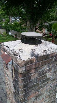 Chimney cap in need of repair.