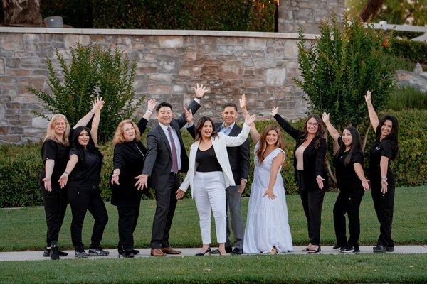 Smiles all around with Dr. Gondara and our friendly  dental team!