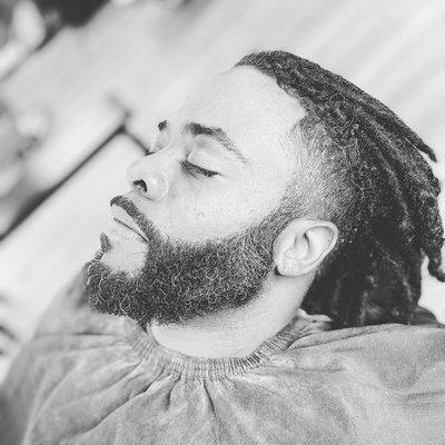 Taper fade done by @a.j_moses.  Beard lining done by me @jpthabarber23