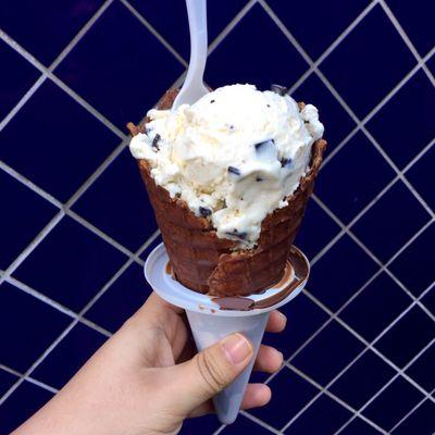 Chocolate chip ice cream in a chocolate dipped waffle cone!