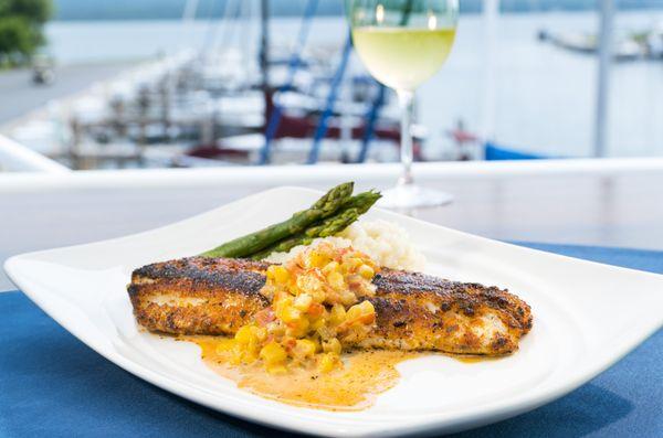 Our tasty Walleye is blackened and served with a corn mock choux.