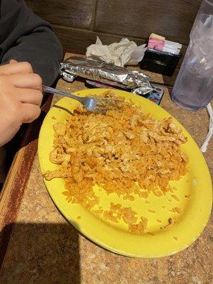 Arroz con pollo, my daughter was already digging in!