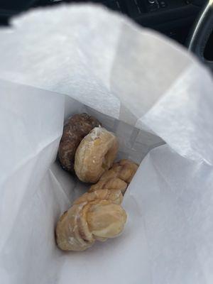 Cinnamon twist, regular glazed donut, and blueberry cake.