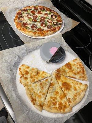 Both pizzas amazing - cheese with white sauce and combo pizza