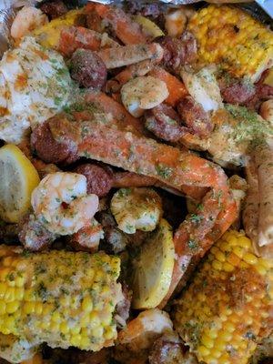 Crab legs , Sausage,  Corn , Shrimp & potatoes