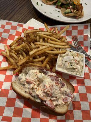 Lobster roll with fries and slaw