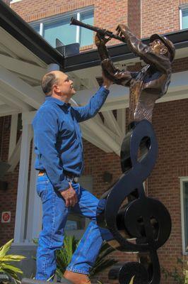 Bradley Cooley with his Life size sculpture he created of Ariel Cassanas Tallahassee,Fl