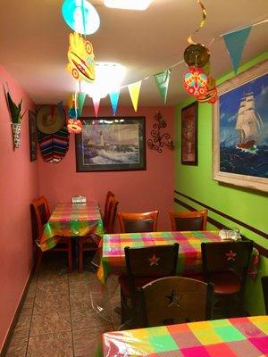 Neat little dining area, nicely decorated.